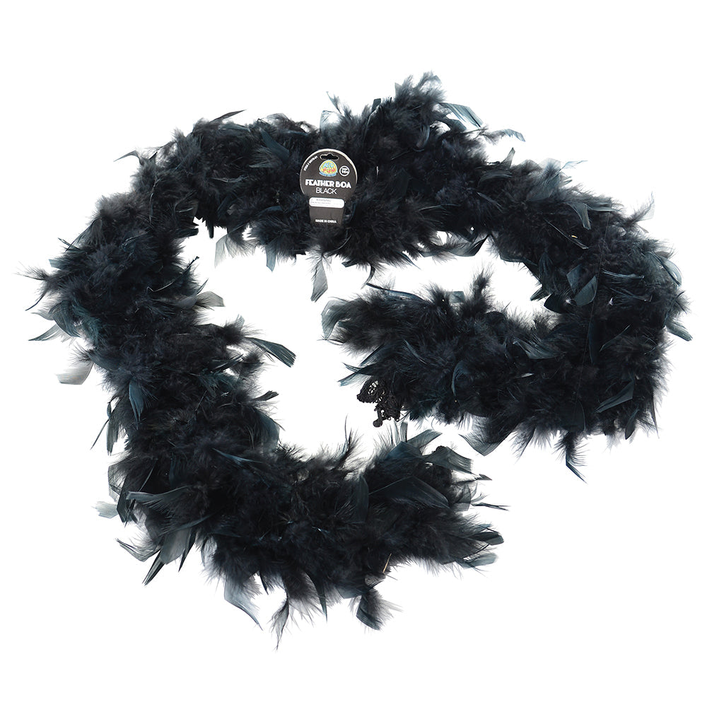Six foot black feather boa coiled on a table as a reusable dress-up item for a Halloween costume accessory station